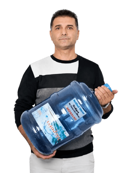 Limassol Water Delivery owner with MERSINI water bottles